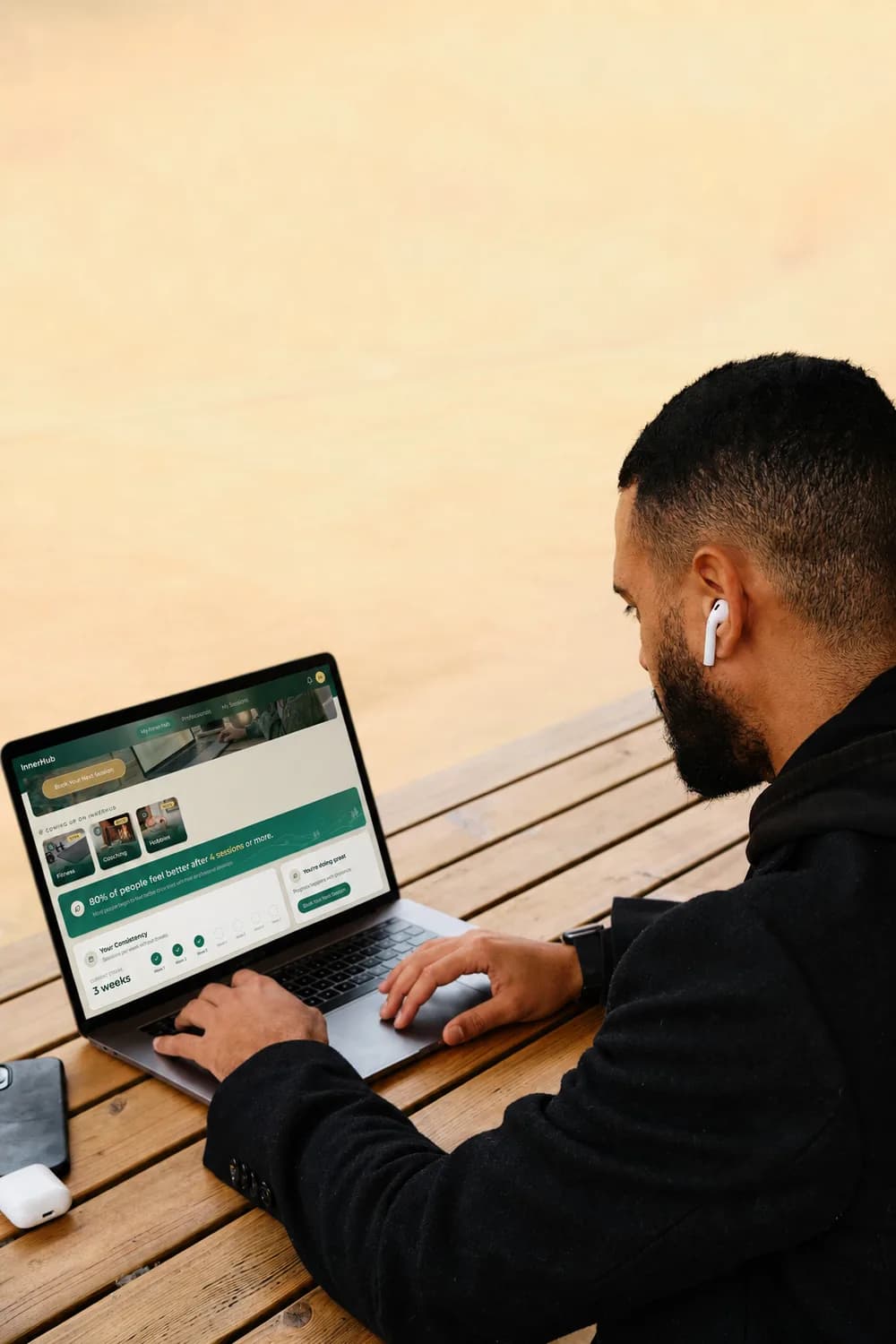 A man using InnerHub on a laptop